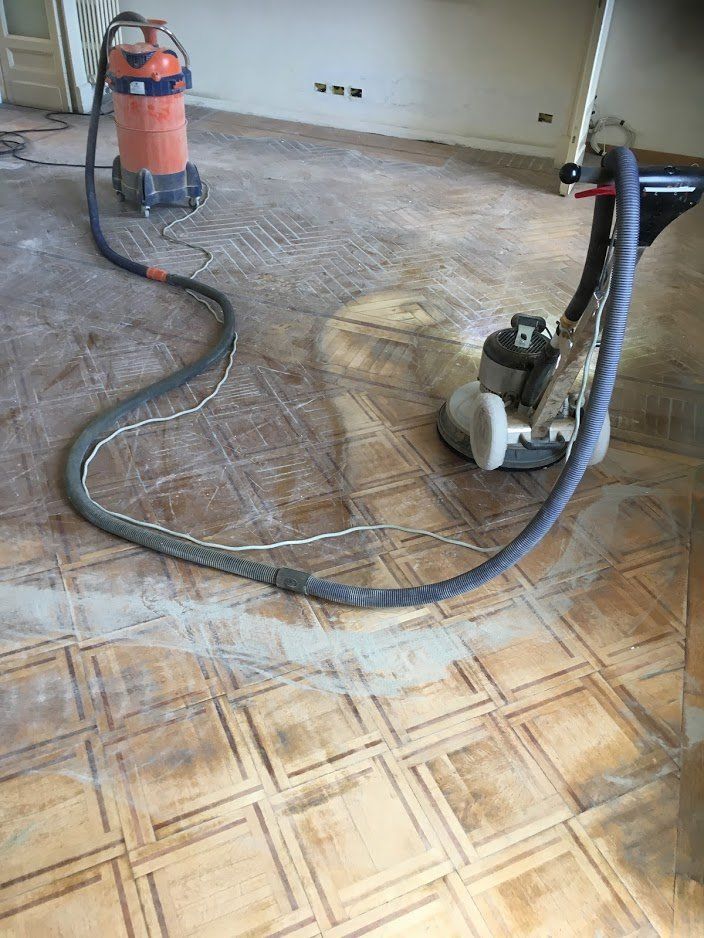 manutenzione pavimento a quadri in rovere