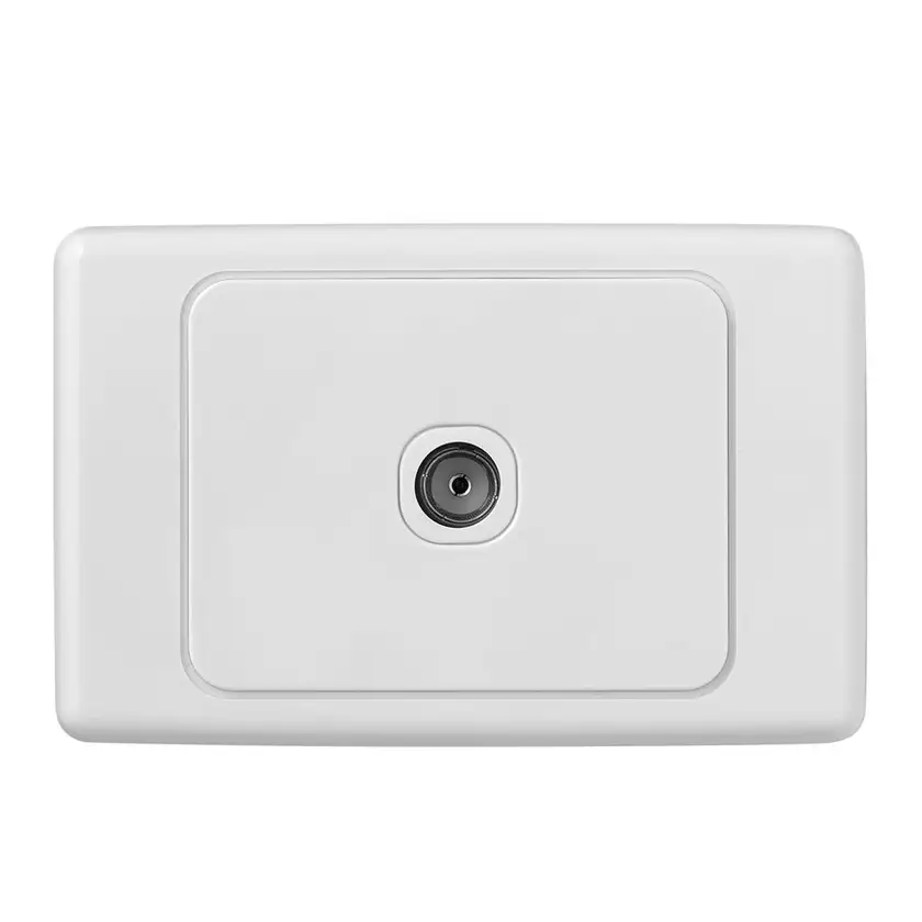 A person is plugging a cord into an electrical outlet