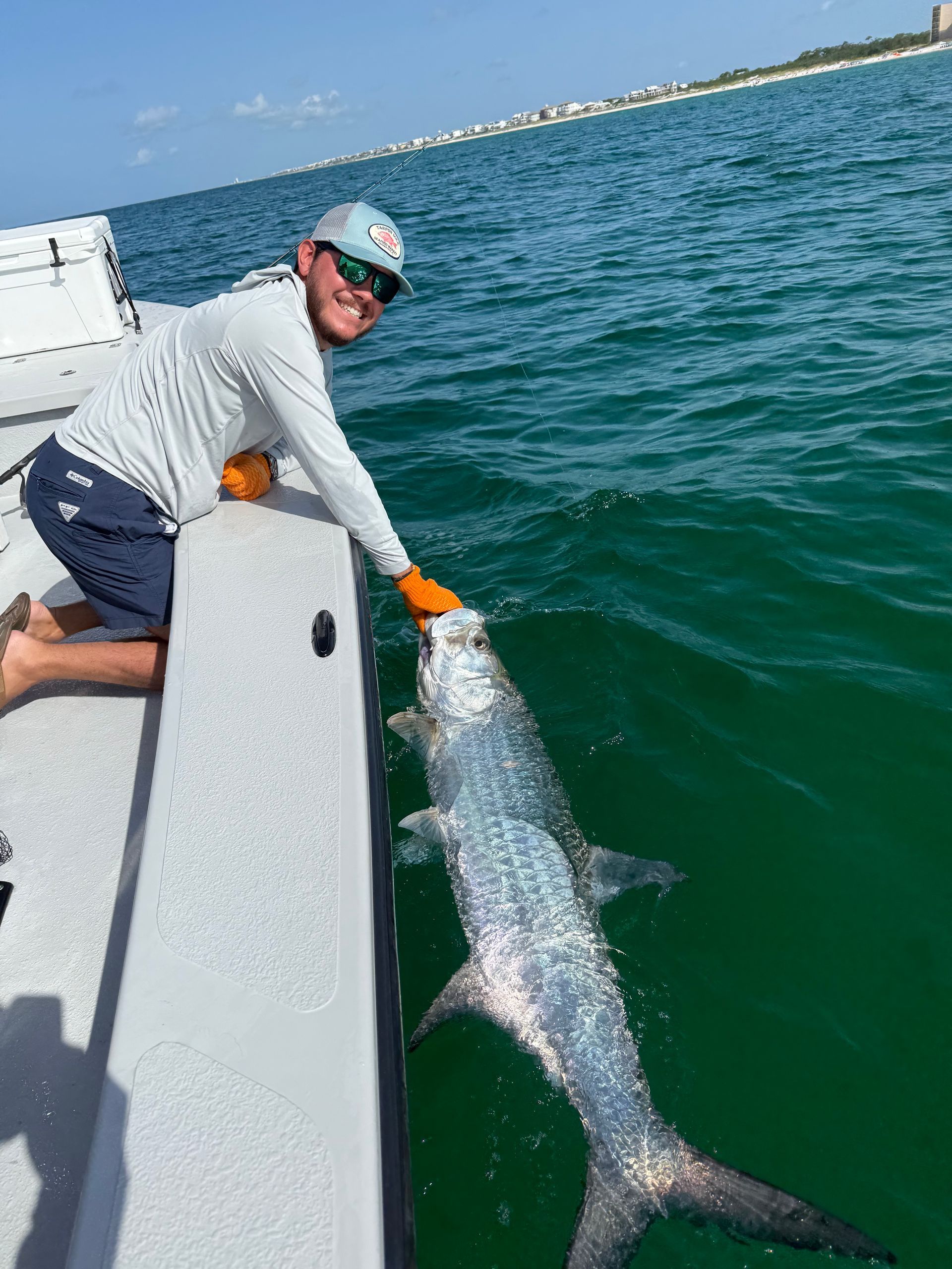 A fish is sitting on top of a fishing net.