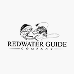 A black and white logo for a fishing company called redwater guide company.