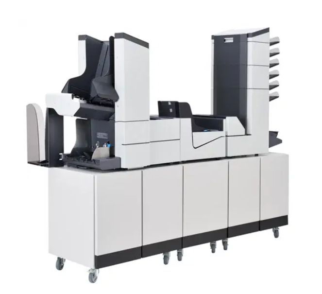 A black and white machine is sitting on top of a white cabinet.