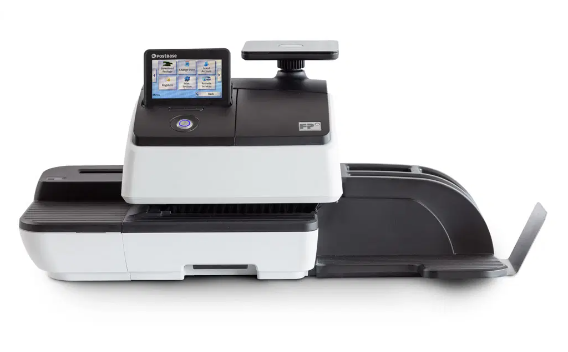 A black and white machine with a screen on top of it