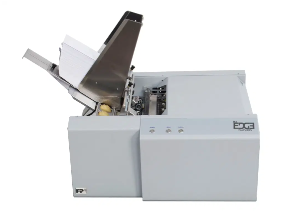 A white printer with the word envelope on it