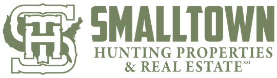 Logo for Smalltown Hunting Properties & Real Estate: green letters, a 