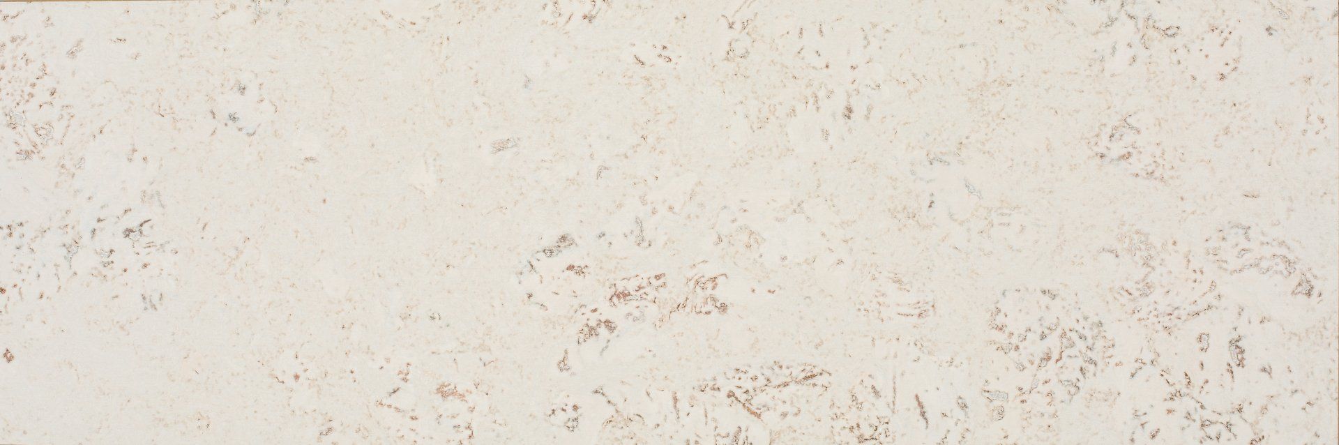 Un gros plan d'un mur blanc avec une texture.