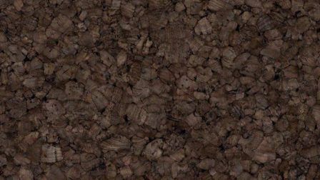 A close up of a pile of brown rocks.