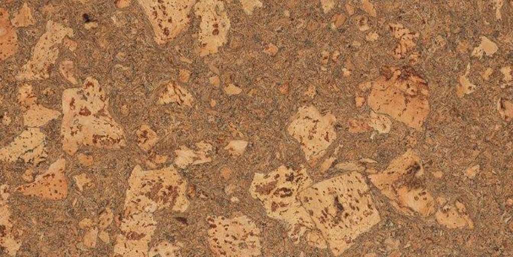 A close up of a piece of cork that looks like sand.