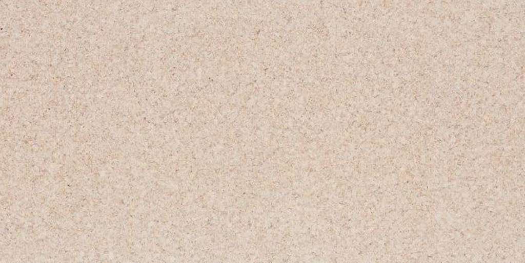 Un gros plan d'une texture de tapis beige.