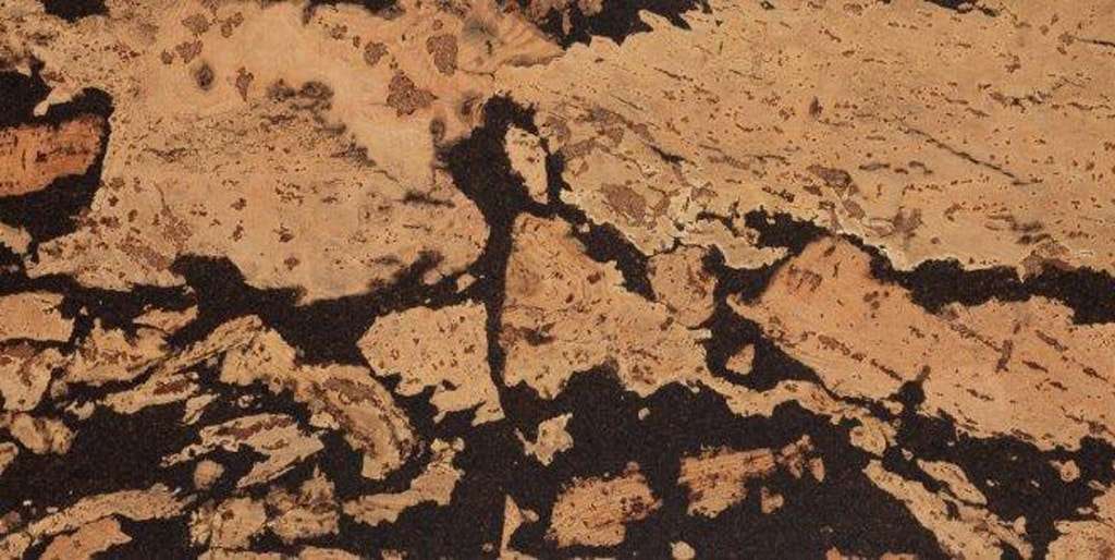 Un gros plan d'une texture de marbre marron et noir