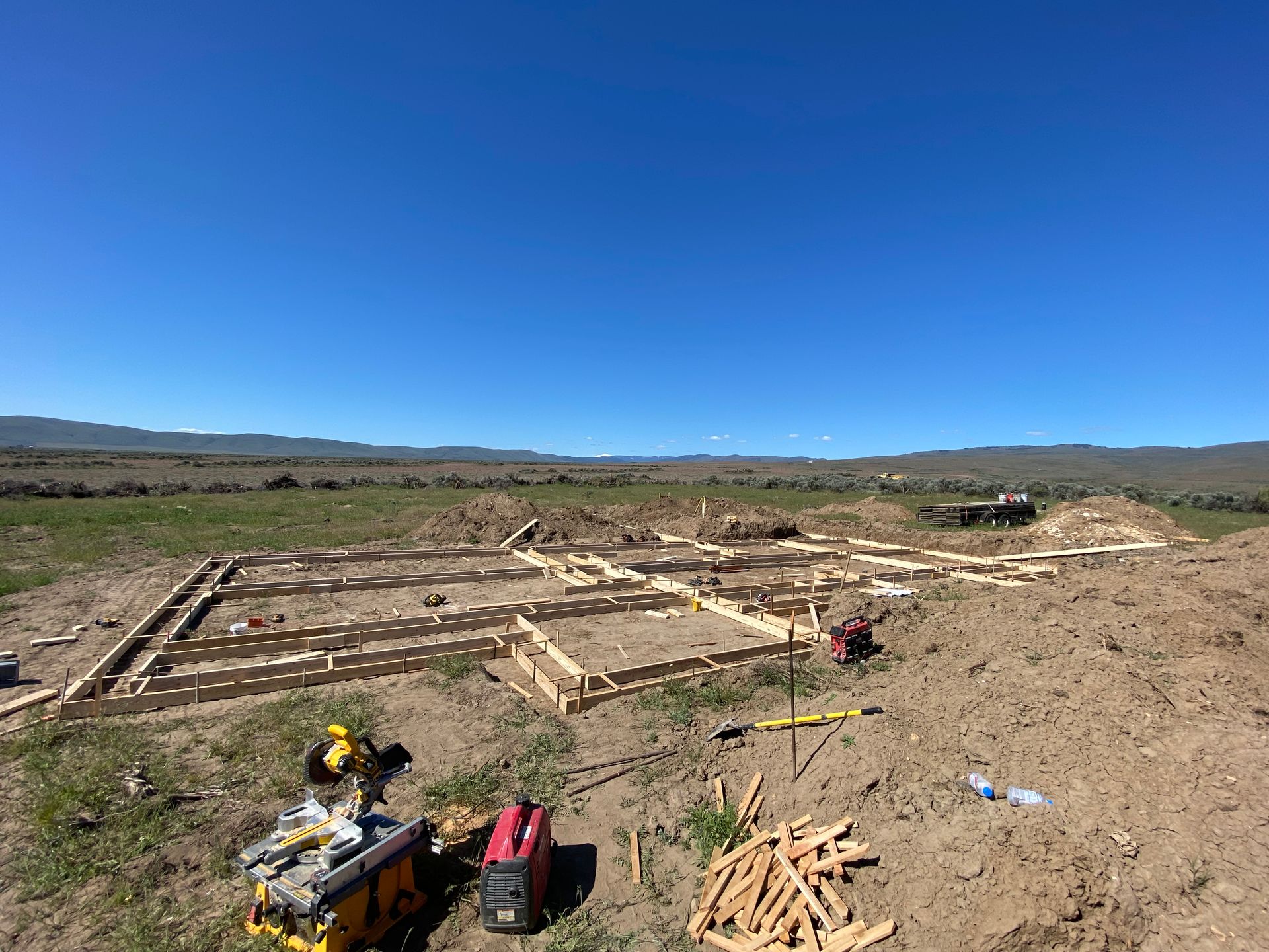 There is a lot of dirt in the middle of a field.