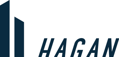 A logo for a company called hogan with a building in the background.