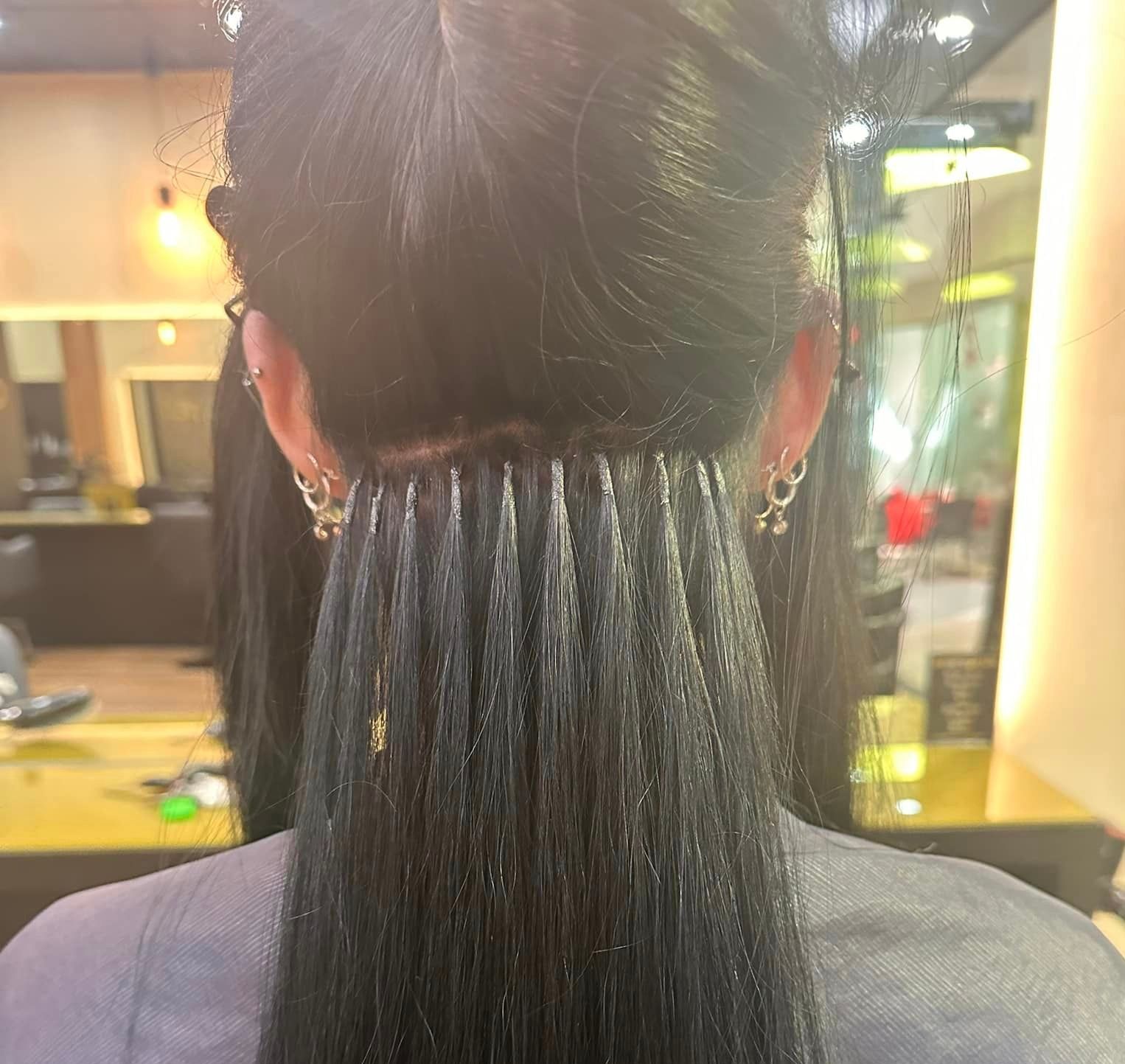 A Photo of A Woman's Hair Extensions Using Ultrasonic by Great Lengths— Capello Hair Design in Port Macquarie, NSW