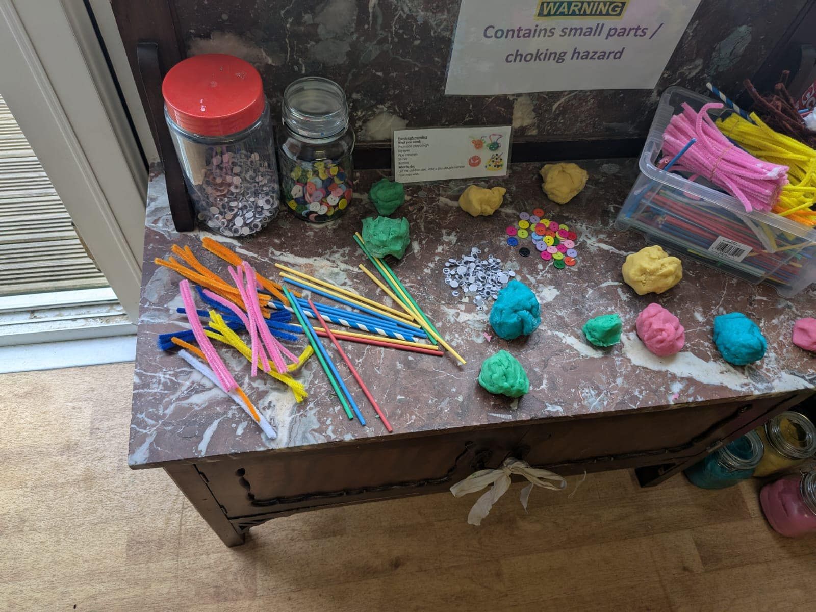 A table with a sign that says 