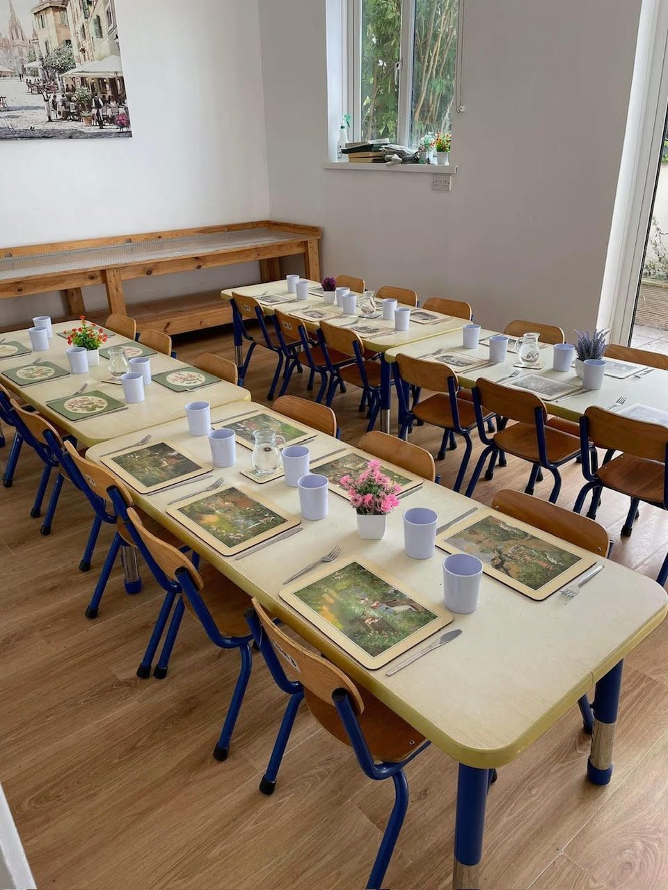 A room with tables and chairs set up for a party