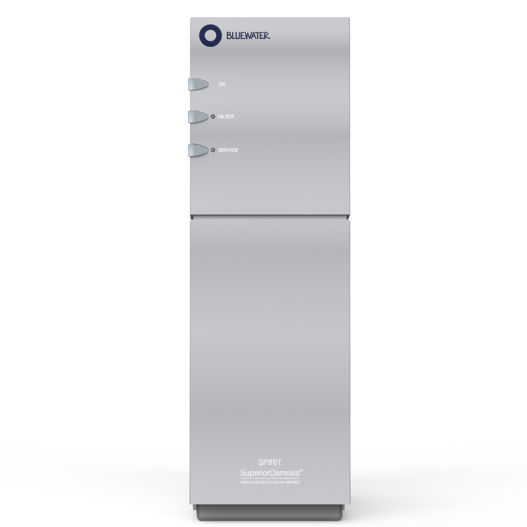 A stainless steel refrigerator is sitting on a white surface.