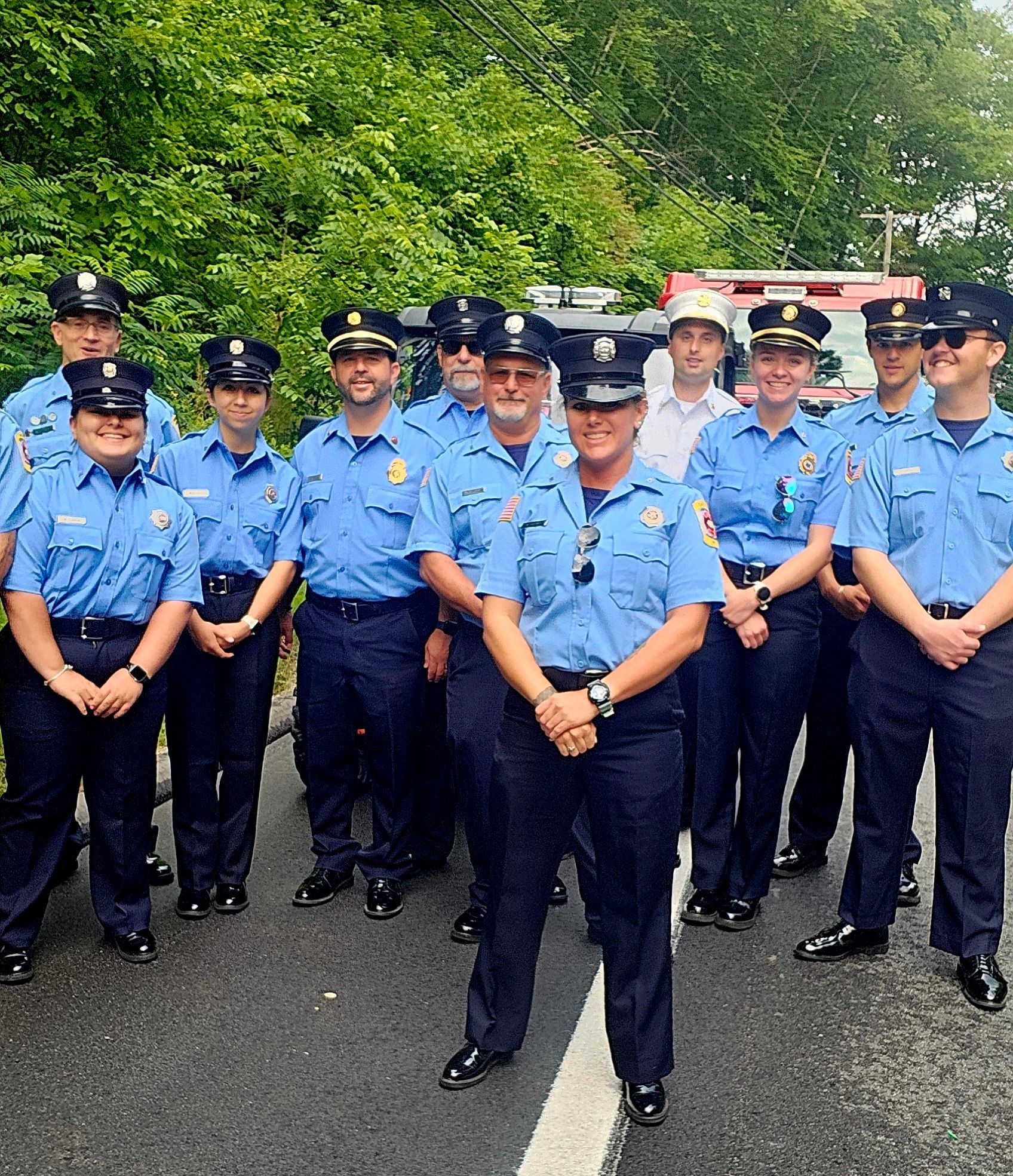 A group of police officers are posing for a picture