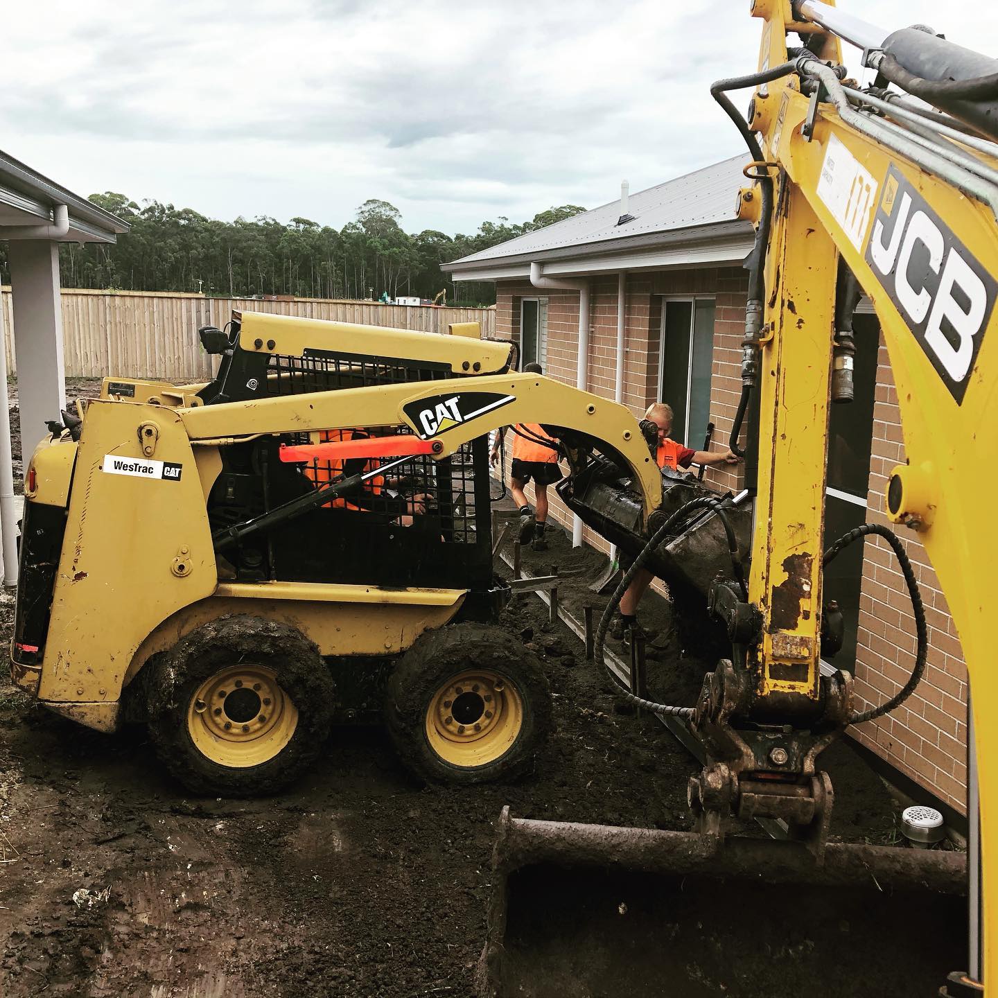 Residential Side Land Clearing with Excavator — Medowie, NSW — Coastcrete
