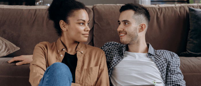A couple sharing a quiet moment and engaging in meaningful conversation.