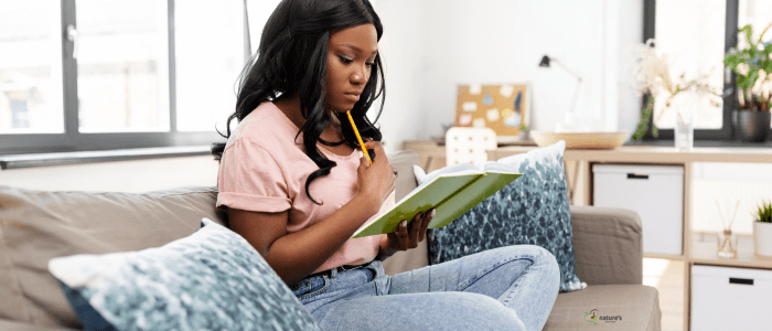 An individual practicing mindfulness, representing self-awareness and emotional regulation.