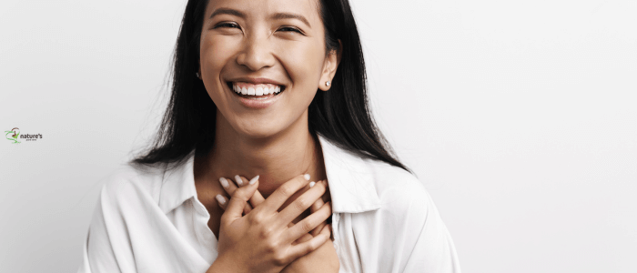 Person feeling joyful, representing the release of positive hormones and the physical effects of thoughts and emotions