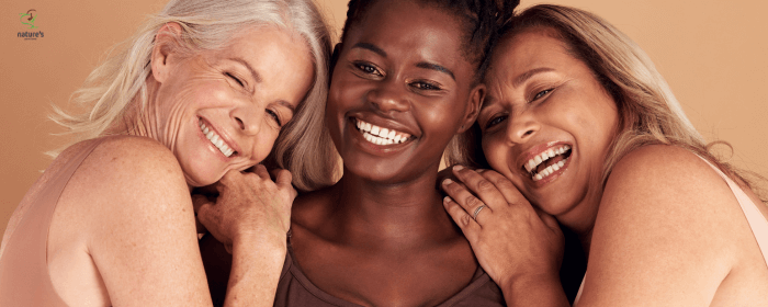 A picture of a group of women of various ages smiling and laughing together.