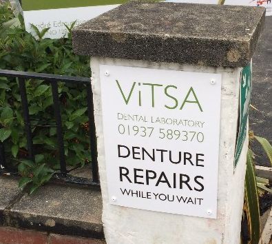 Denture repair sign