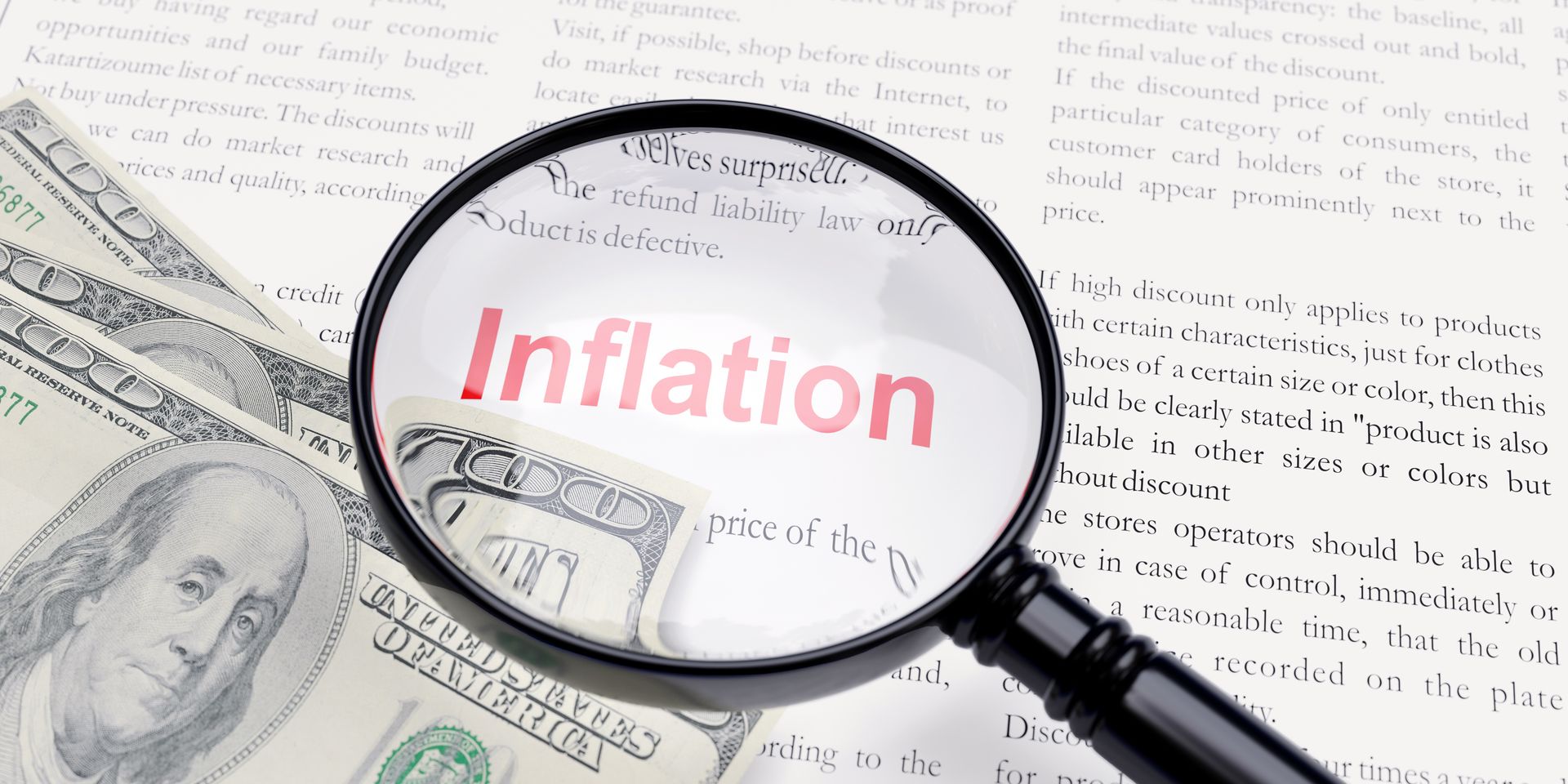 the word inflation in magnifying glass