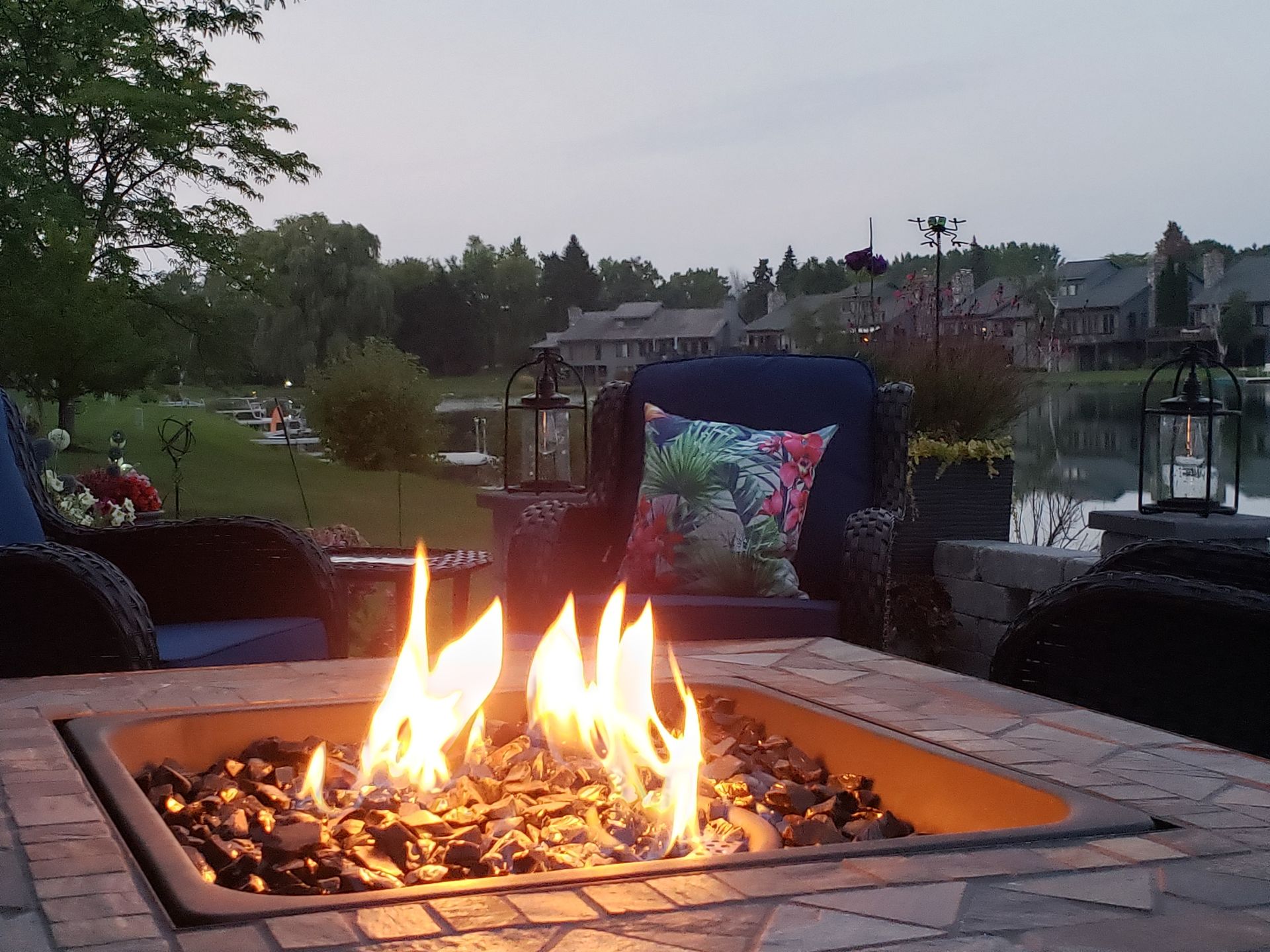 A fire pit with flames coming out of it