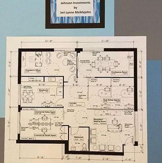 A floor plan of a building with a sign that says johnson investments