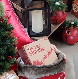 A box that says tis the season on it