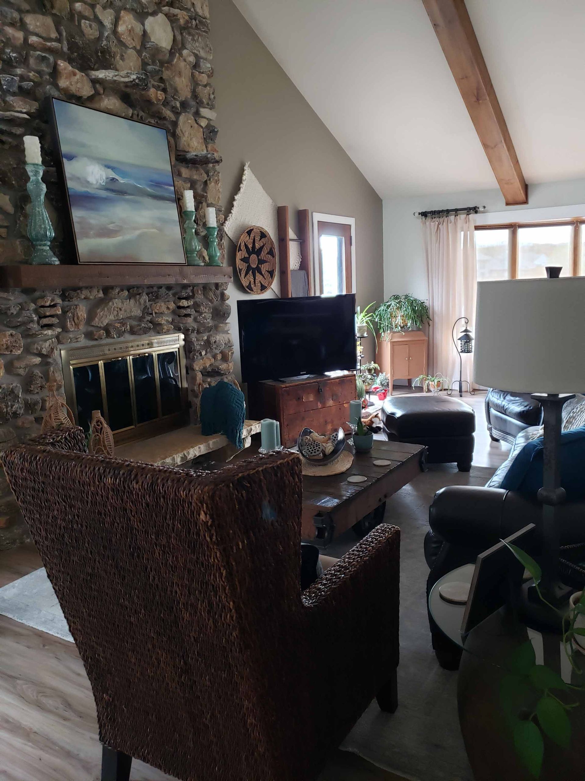 A living room filled with furniture and a fireplace