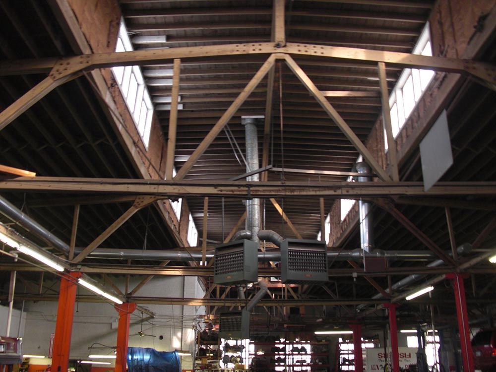The inside of a building with a ceiling that is very high