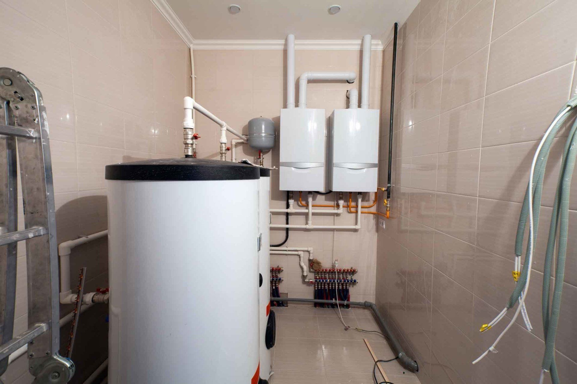 Hot water Heater and Furnace in Basement — Santa Rosa, CA — Action Plumbing & Heating Maintenance