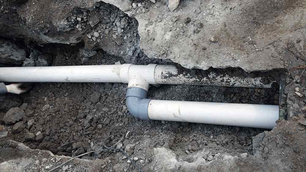 Sewer and Drain Cleaning — Working on Pipe Connection in Santa Rosa, CA