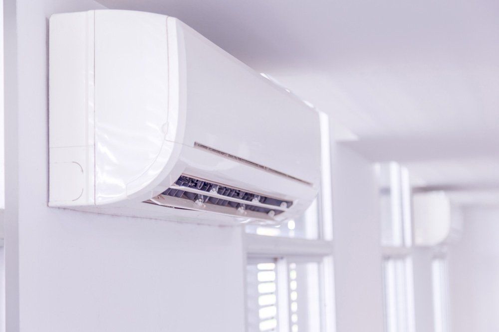 White Air Conditioner — Santa Rosa, CA — Action Plumbing & Heating Maintenance