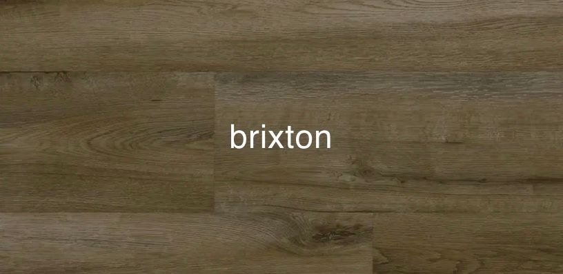 A close up of a wooden floor with the word brixton on it.