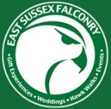 The east sussex falconry logo is green and white and shows a falcon 's head in a circle.