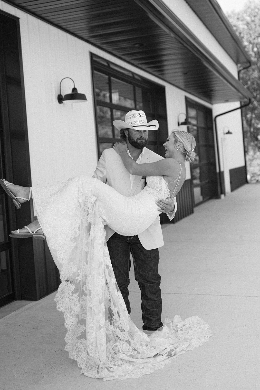 Celebrate Your First Look as a Bride & Groom at the Champagne Barn in Harrisburg, MO.