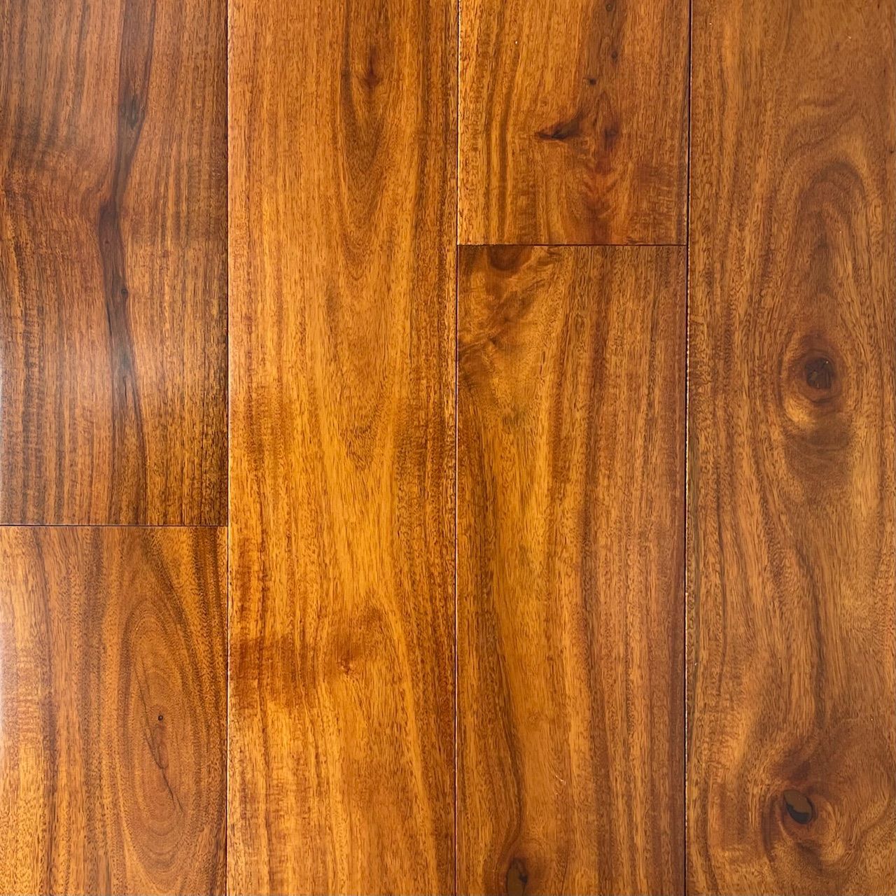 A close up of a wooden floor with a lot of grain.