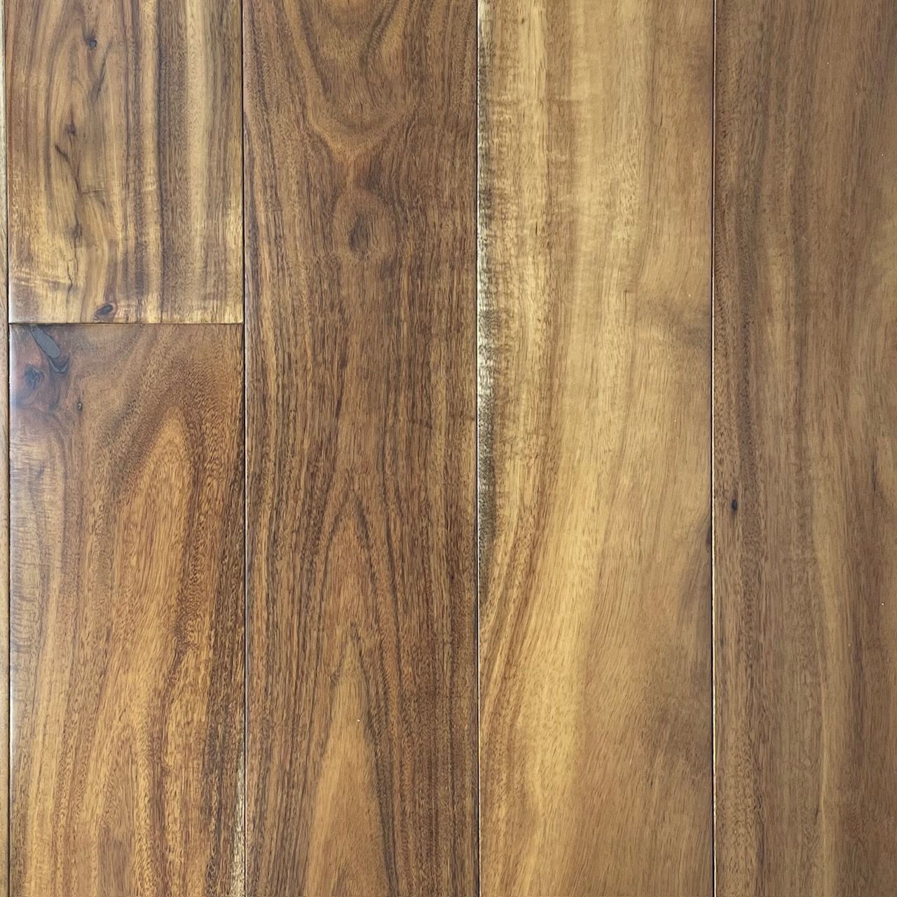A close up of a wooden floor with a grain and texture.