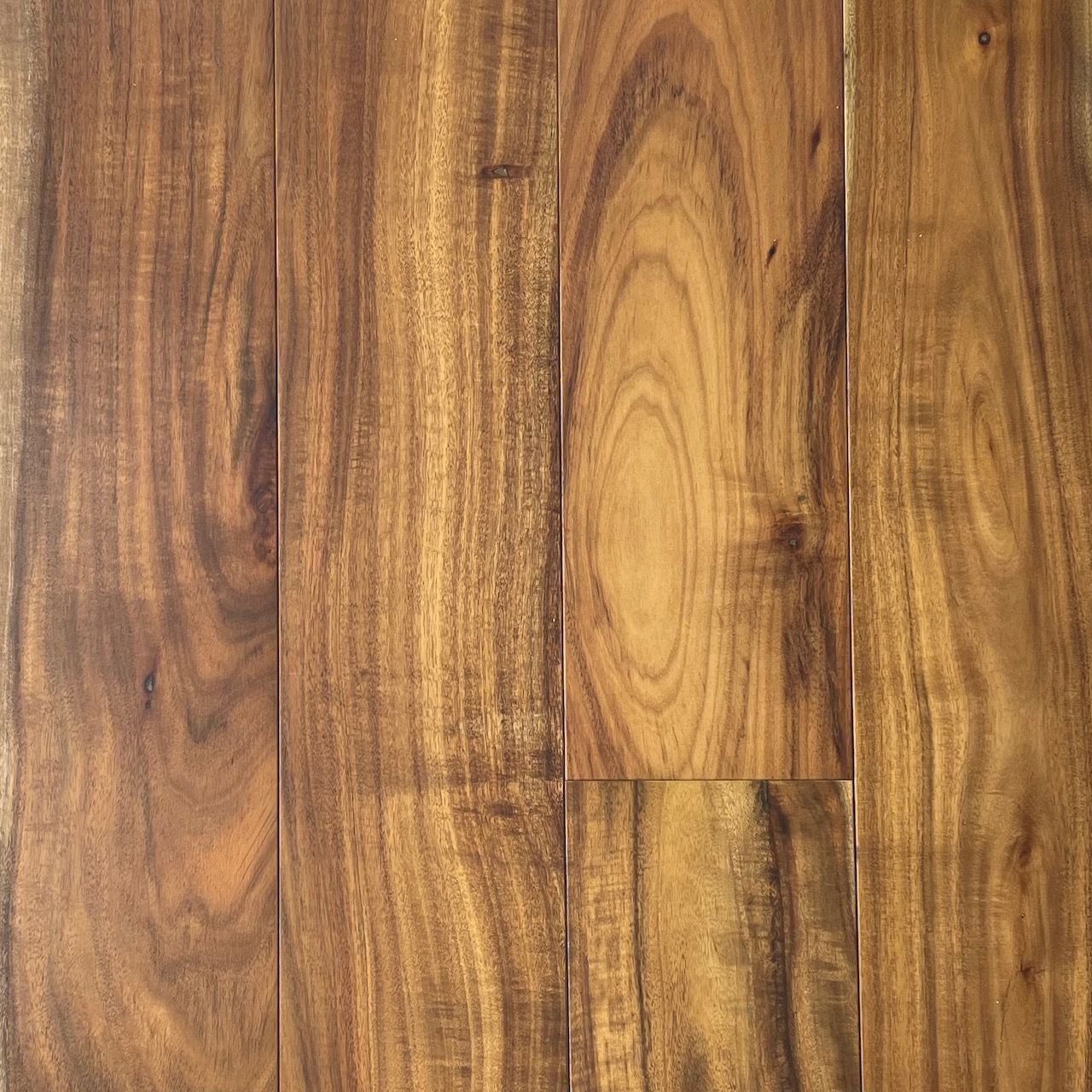 A close up of a wooden floor with a grain and texture.