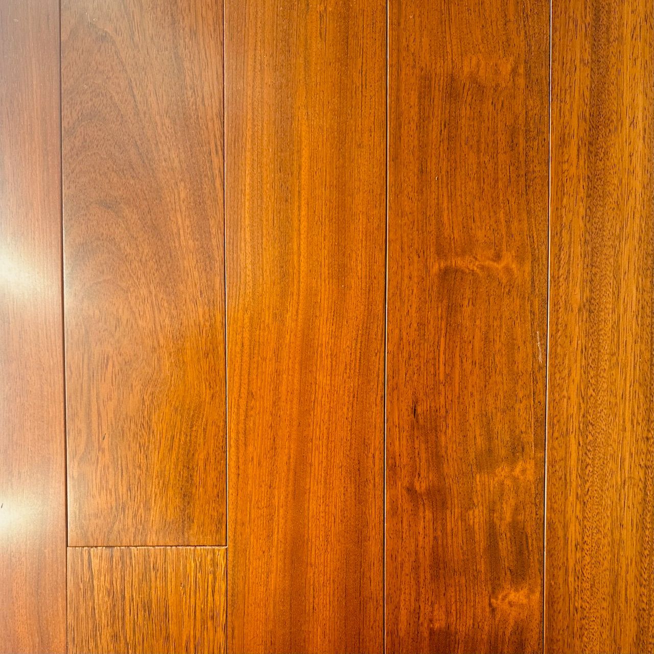 It is a close up of a wooden floor.