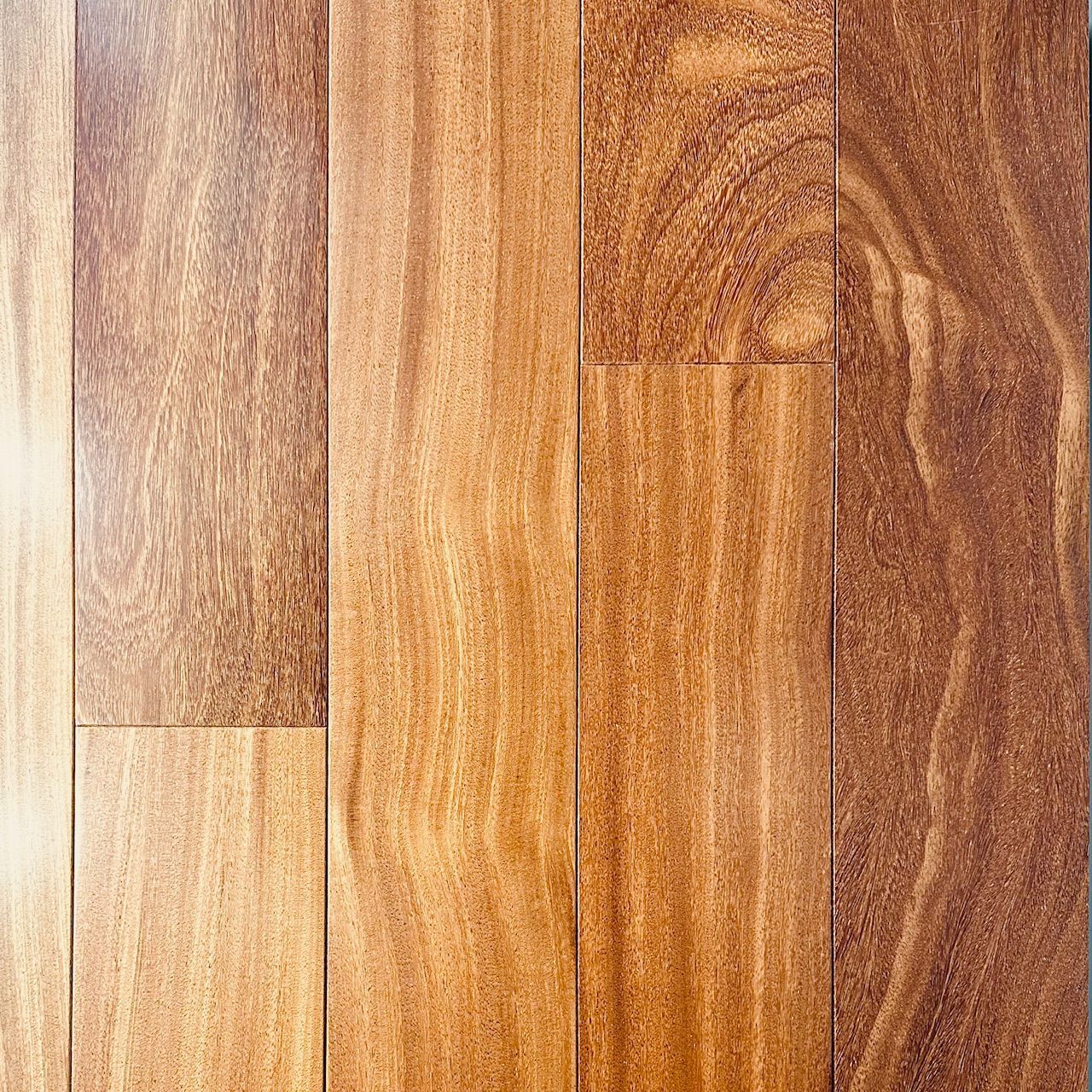 A close up of a wooden floor with a lot of grain