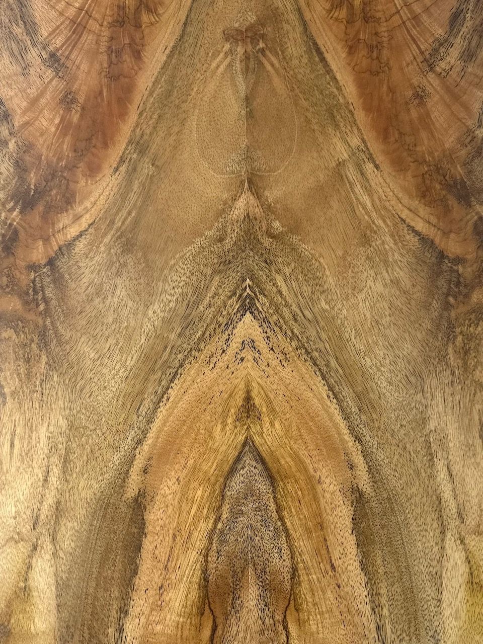 A close up of a piece of wood with a pattern on it.