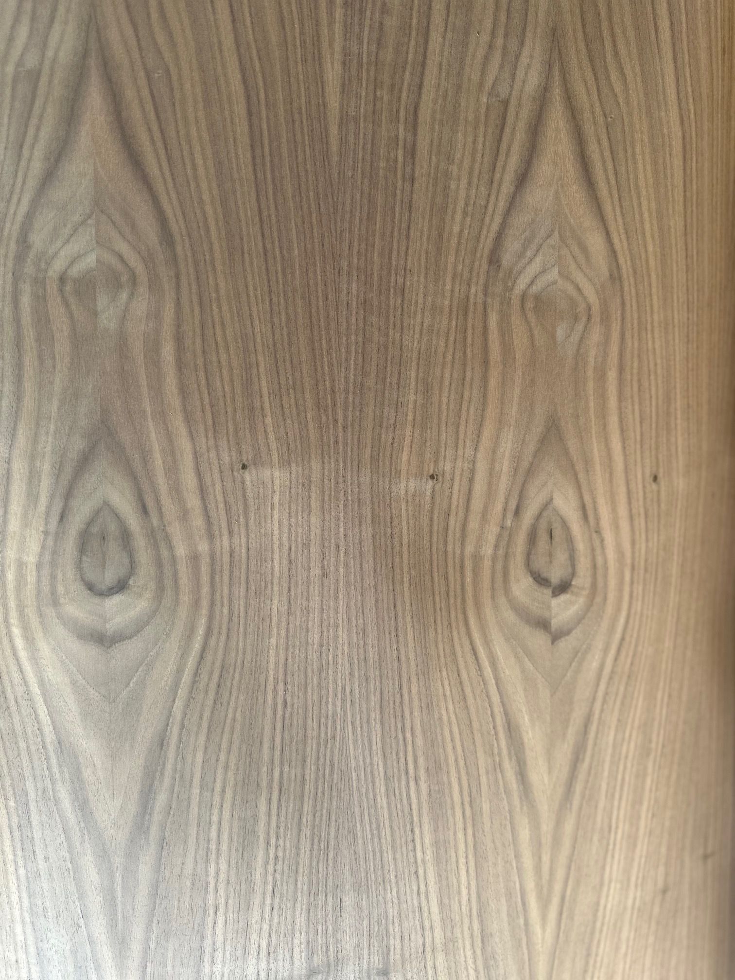A close up of a piece of wood with a pattern on it.