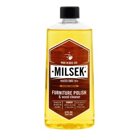 A bottle of milsek furniture polish and wood cleaner.