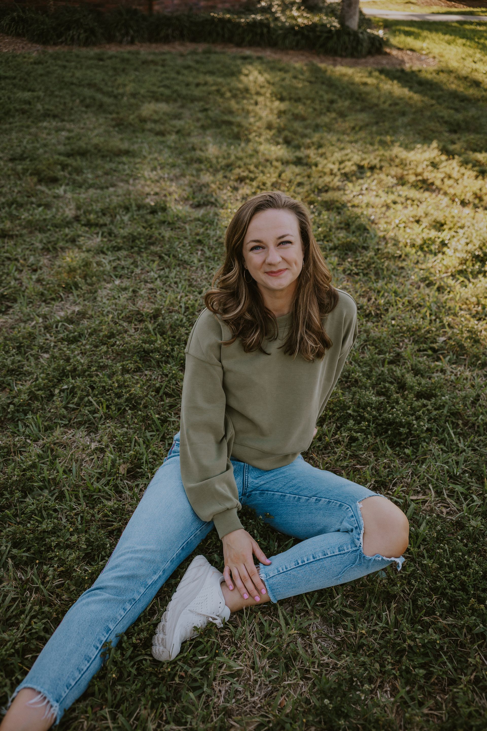 Lauren Bauer sitting in grass