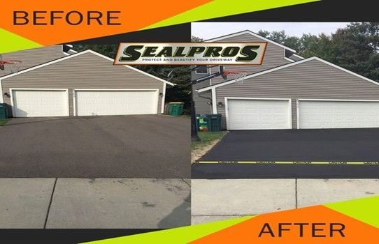 Close-up of a road construction truck spraying asphalt on a surface.