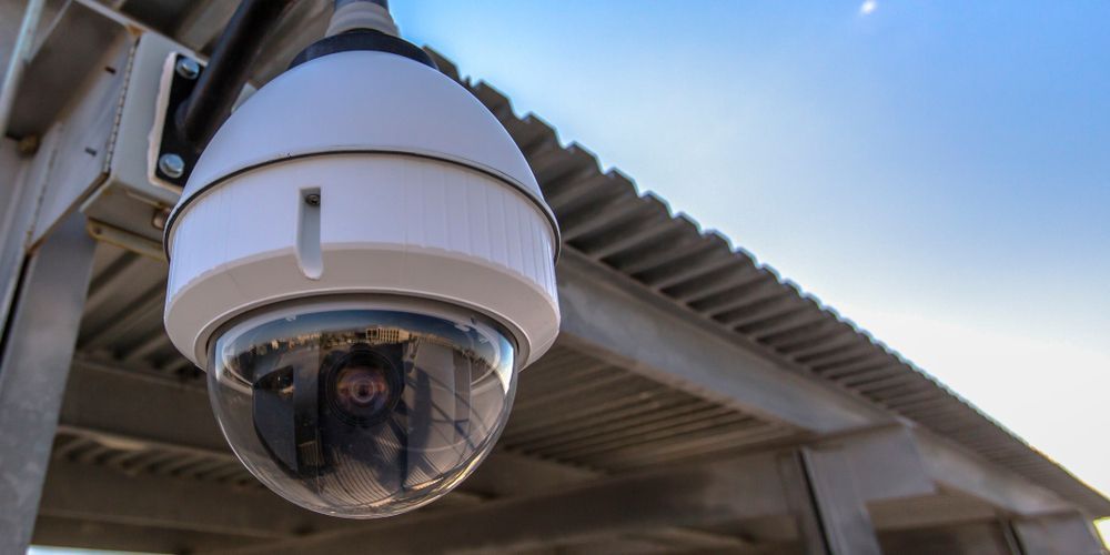 Close-up of a White Dome Security Camera Mounted — NQ Video Surveillance in Mt Isa, QLD