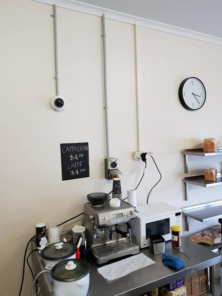 Coffee Shop Counter With Cctv on the Wall — NQ Video Surveillance in Townsville, QLD